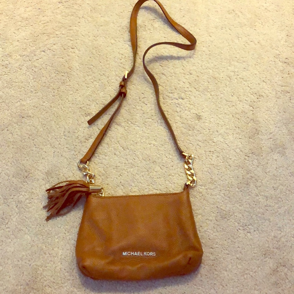 Tan crossbody Michael Kors purse